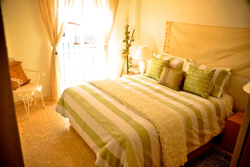 This bedroom has a balconette.