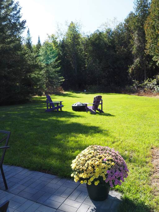 Large backyard with firepit