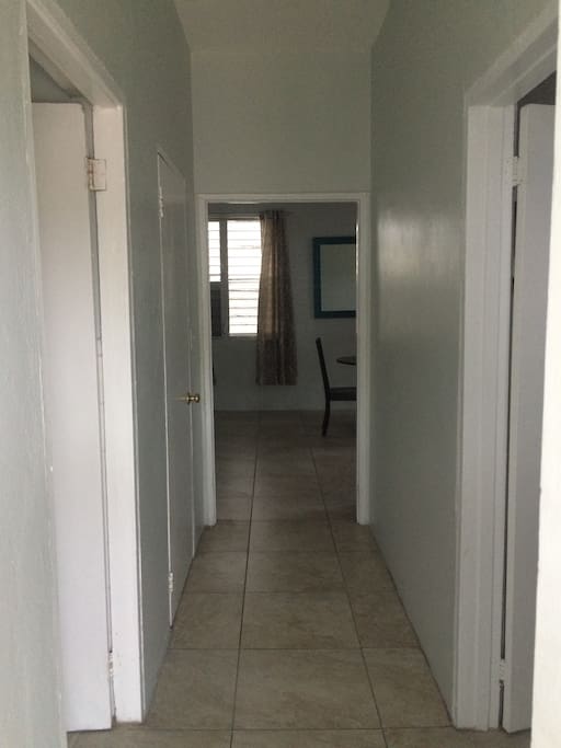 View from front door entrance. Bedroom is to the right. Bathroom and large closet is to the left. Kitchen and dining area straight ahead.