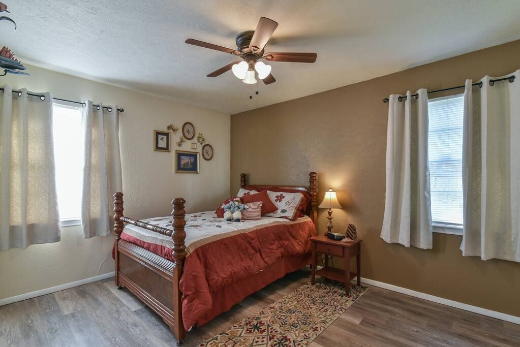 Comfortable antique double bed with new mattress.