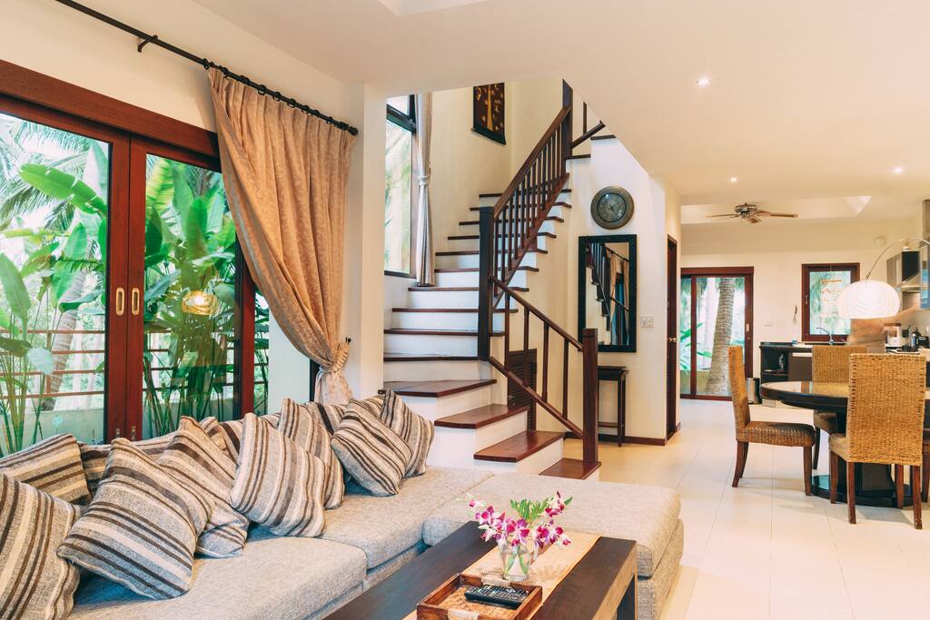 Living room, stairs to the upper floor