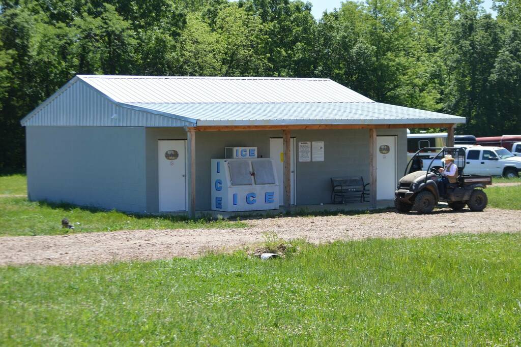 Heated and air conditioned guest shower house