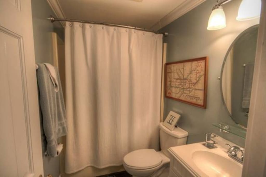 Private bathroom, with bath tub, white suite