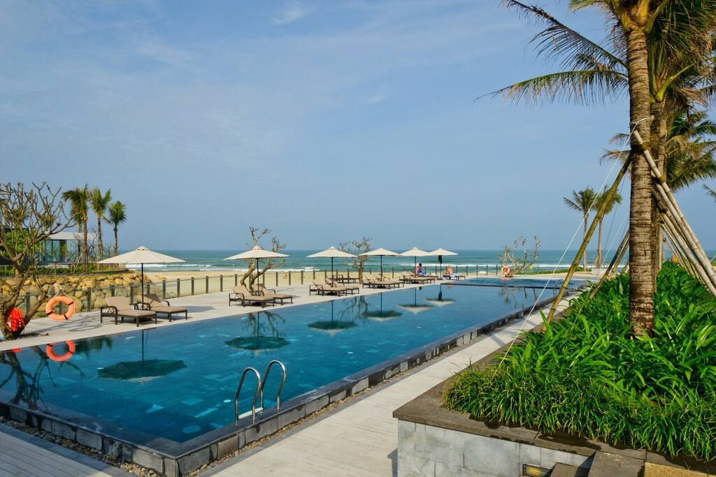 You can access the main pool area right in front of the beach club and restaurant.