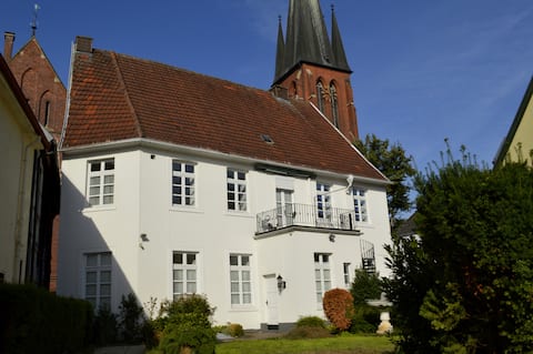Apartment with balcony in a listed building