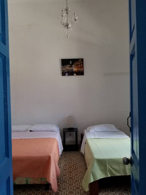 Room 2, spacious with natural sun light & tall doors/windows
