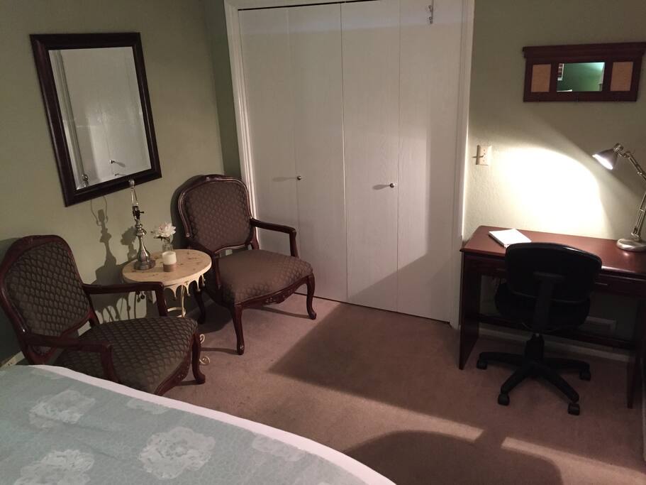 Two side chairs with table.