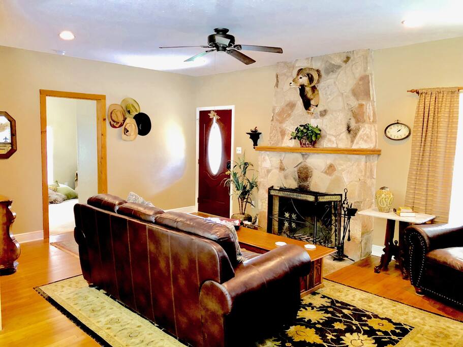 Living room with wood burning fireplace