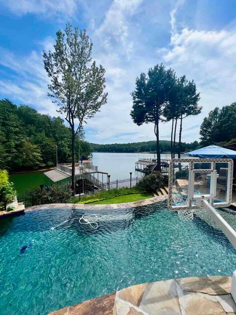 Intimate lake retreat with stunning infinity pool