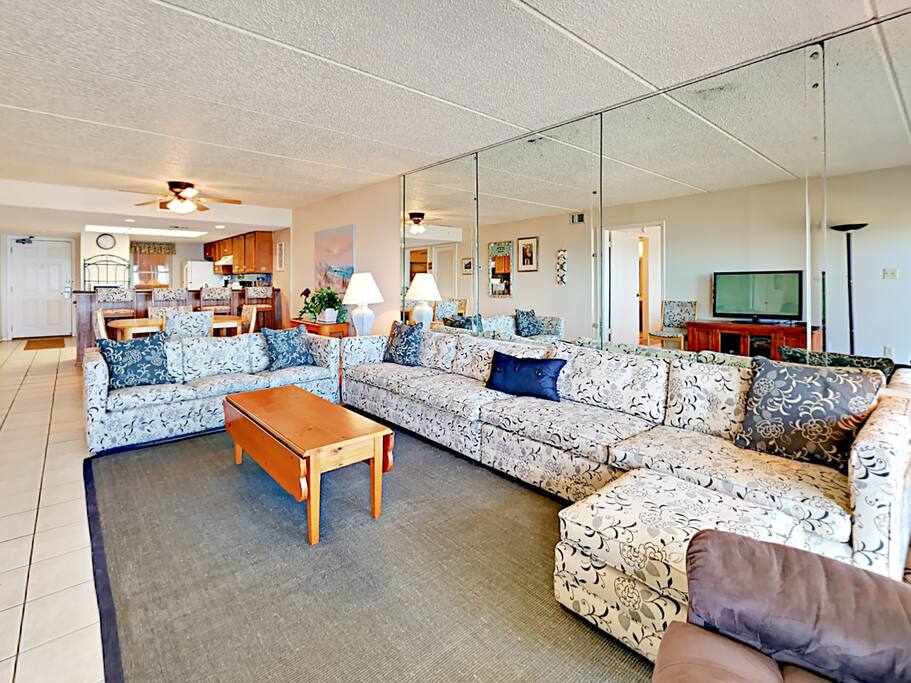 Spacious open-plan living area. Professional housekeeping provided by TurnKey.