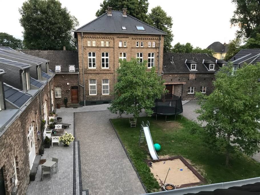 view from the bathroom window into the yard