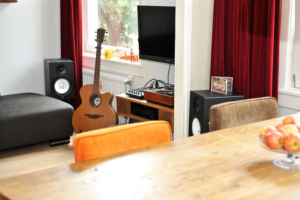 Lovely living room with diner table and just around the corner great couch