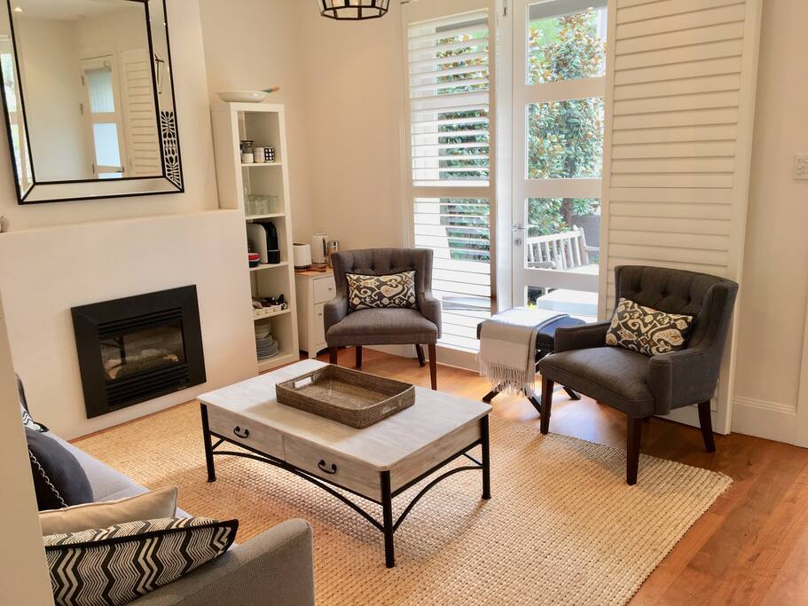 lounge room with basic kitchen requirements