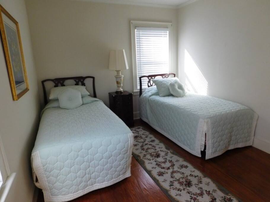 Bedroom with two twin beds.