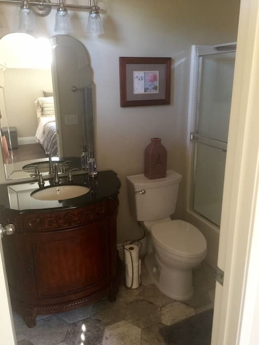 newly remodeled private bathroom wit shower and tub