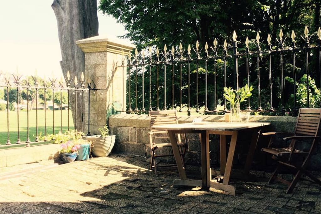 The garden looks onto a Victorian Park