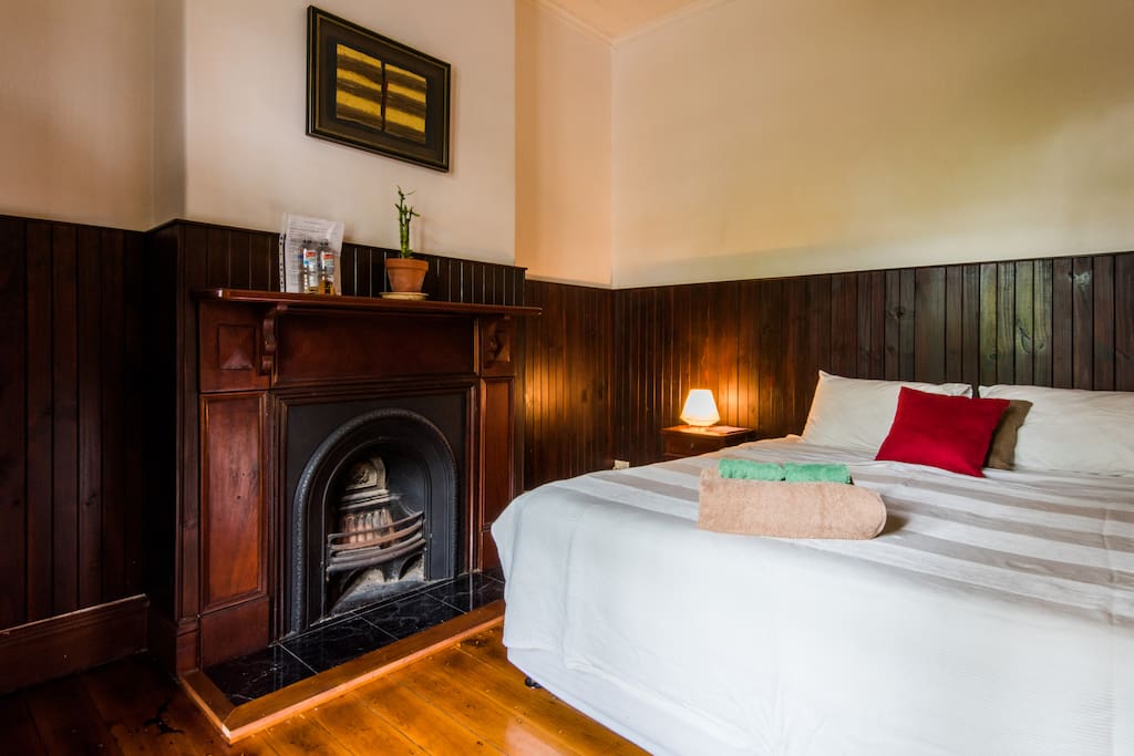 Bedroom and wooden wall panelling