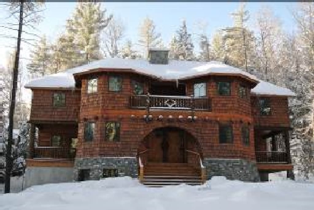 Winter view. Note large outdoor covered deck