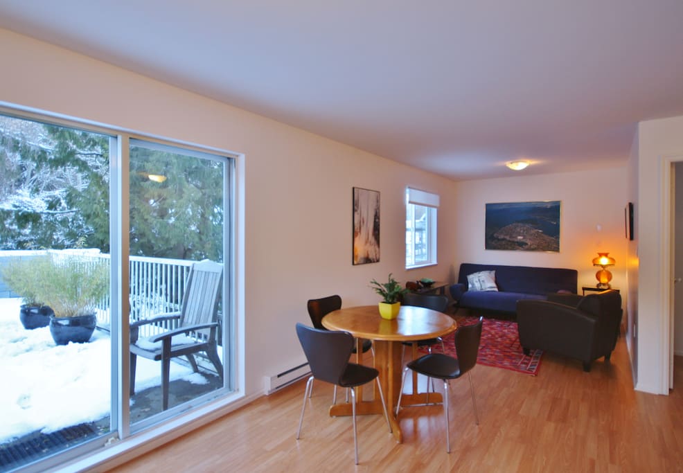Living space and sliding doors to deck.