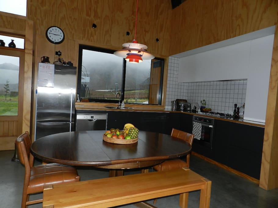 Open plan dining and kitchen area. Spacious kitchen.