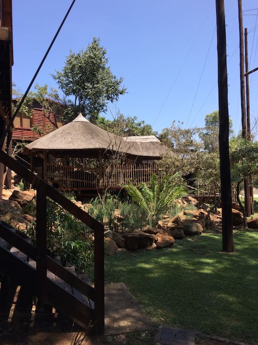 Thatched outside conference area at waterfall
