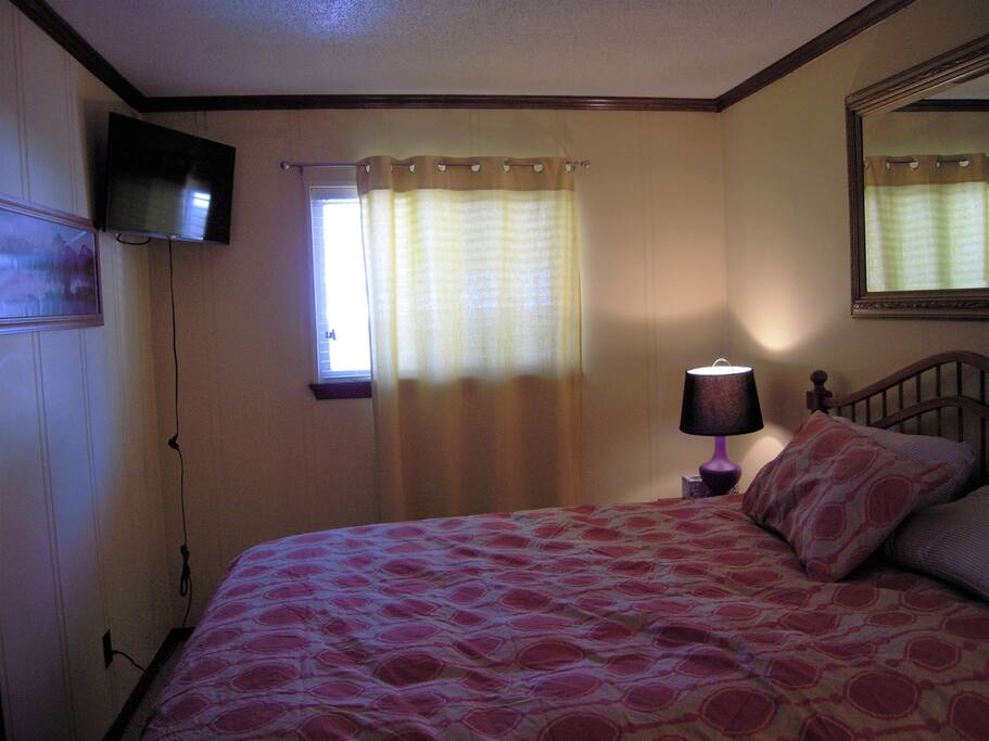 Master bedroom with TV