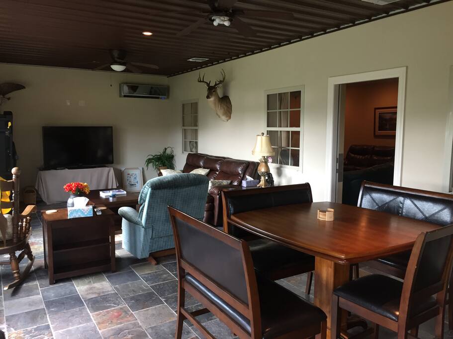Sunroom living area with attached kitchen (other photo).
