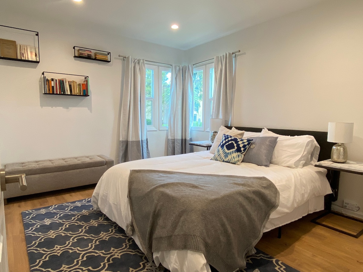 Bedroom #2: corner window with blackout curtains.  Lots of closet space.