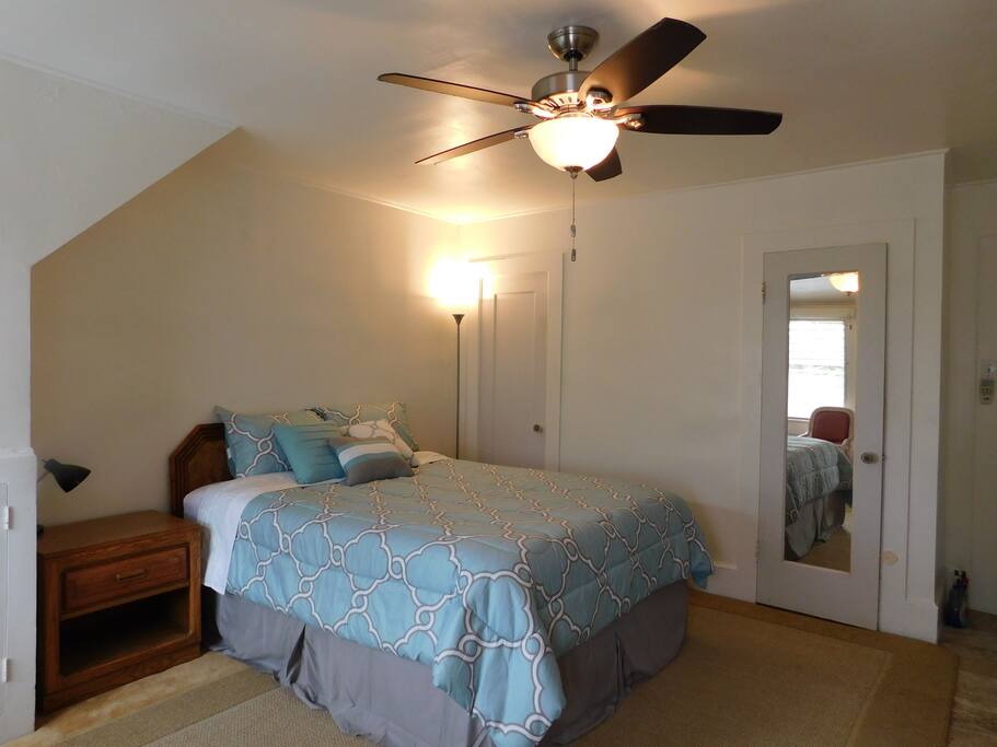 Queen Bed and Ceiling Fan