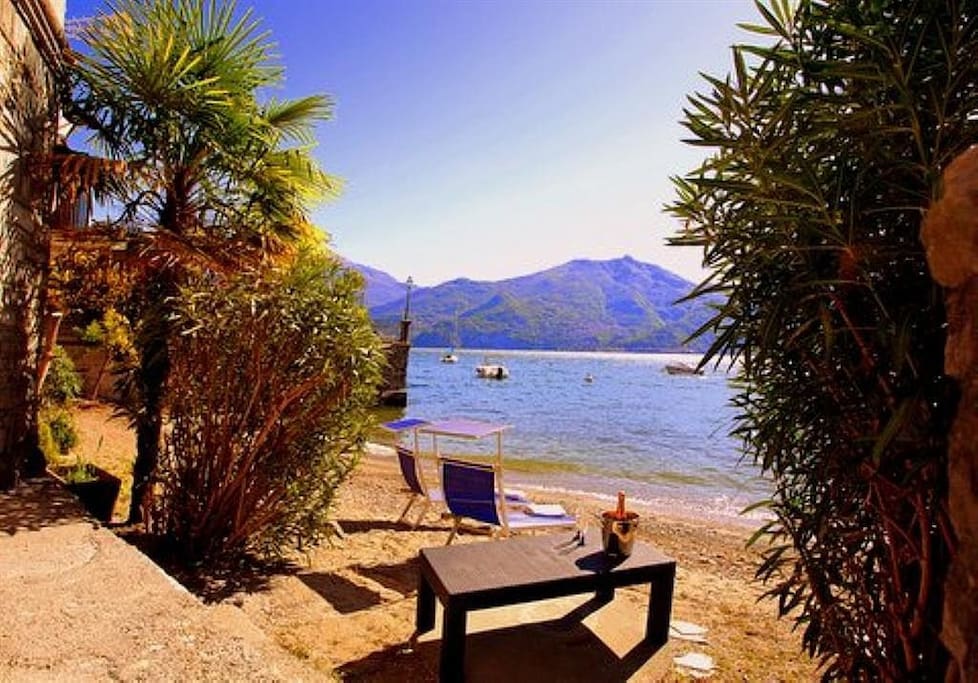Relax on the beach located in front of the home!