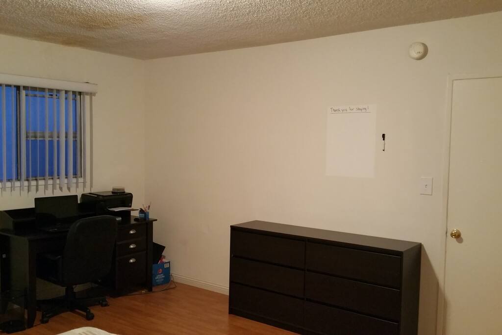 Desk, and double sided Chester drawer.