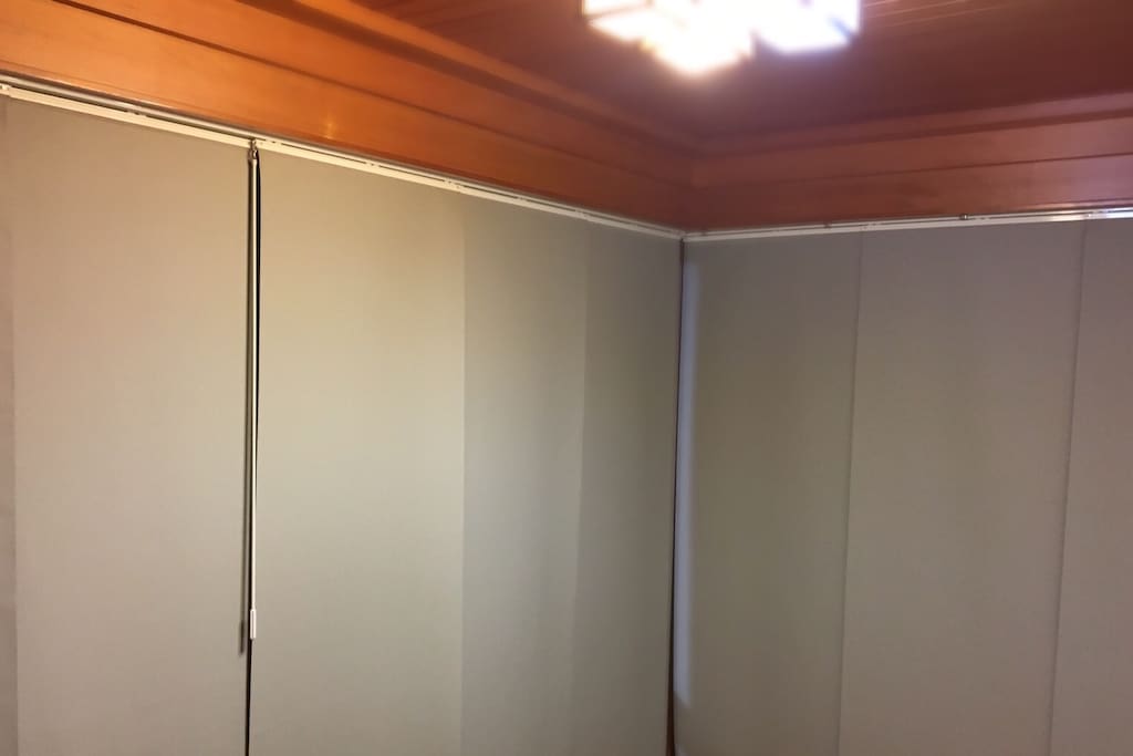 The tatami room is minimal. No door. Just hanging curtains. Please be aware there is no lock.