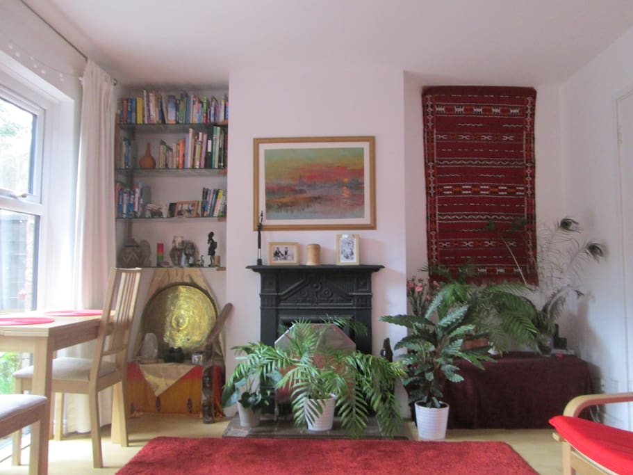 Living / dining room with open fire. I often light the fire on cold winter weekend evenings