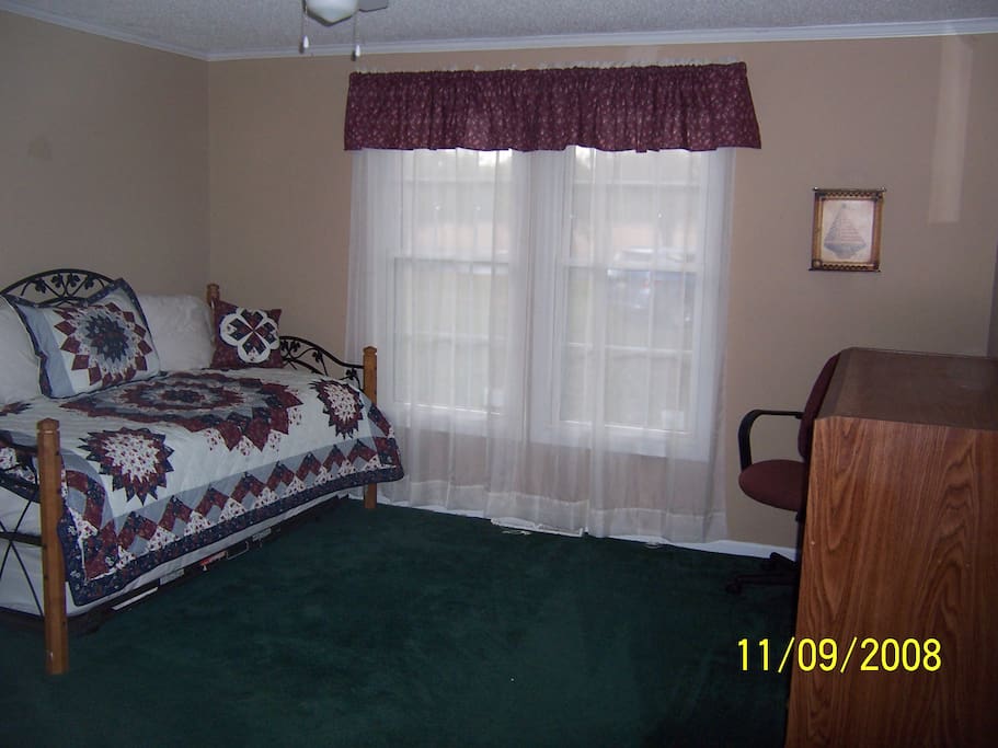 Green Bedroom 2 trundle single beds