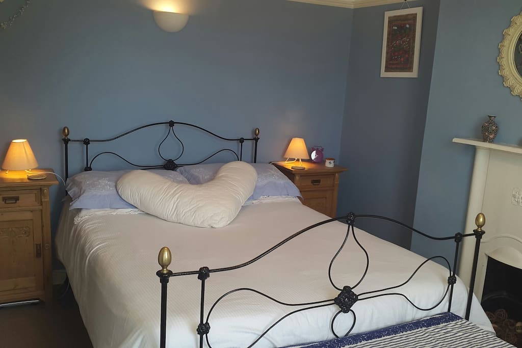 Antique cast iron bed, antique bedside cabinets