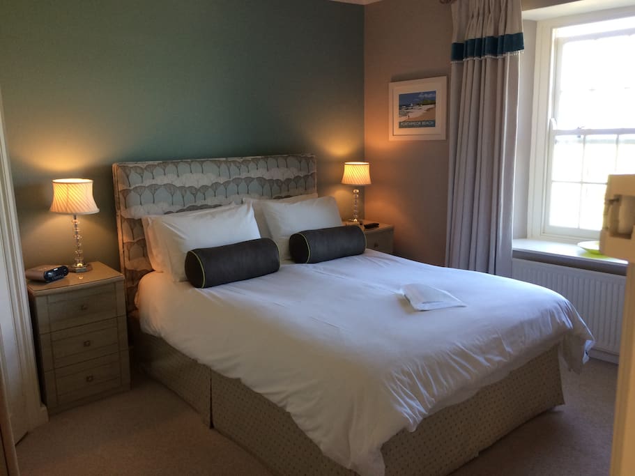 Our Lamorna room, which offers a king-size bed, en suite and enjoys a beautiful sea view