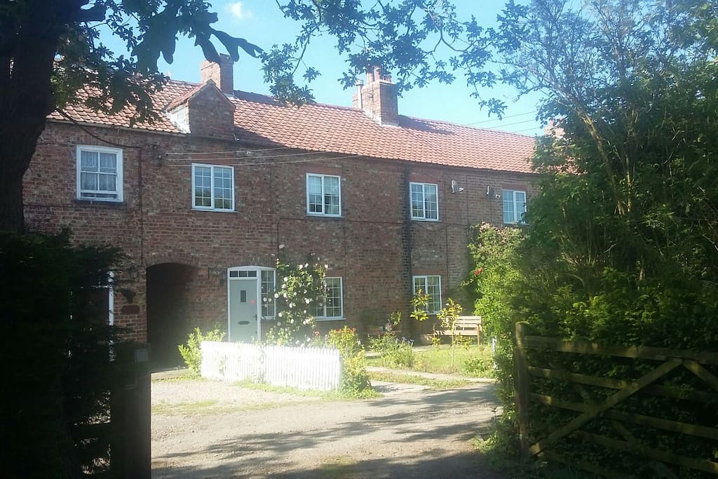 our cottage is part of a row of four old workers cottages
