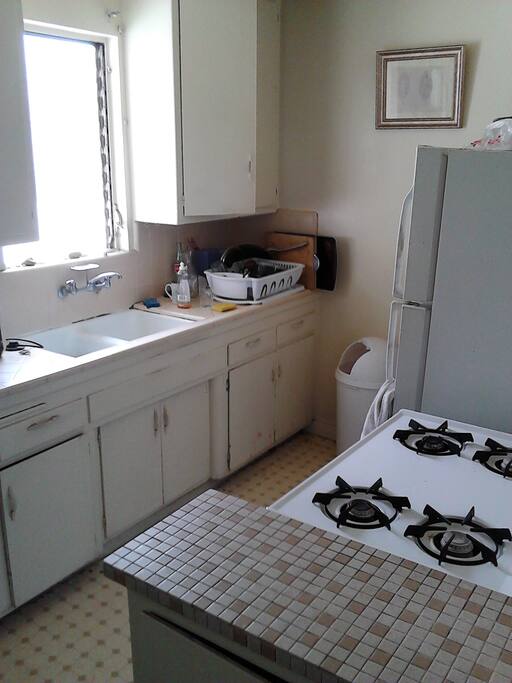 Kitchen w/refrigerator and stove