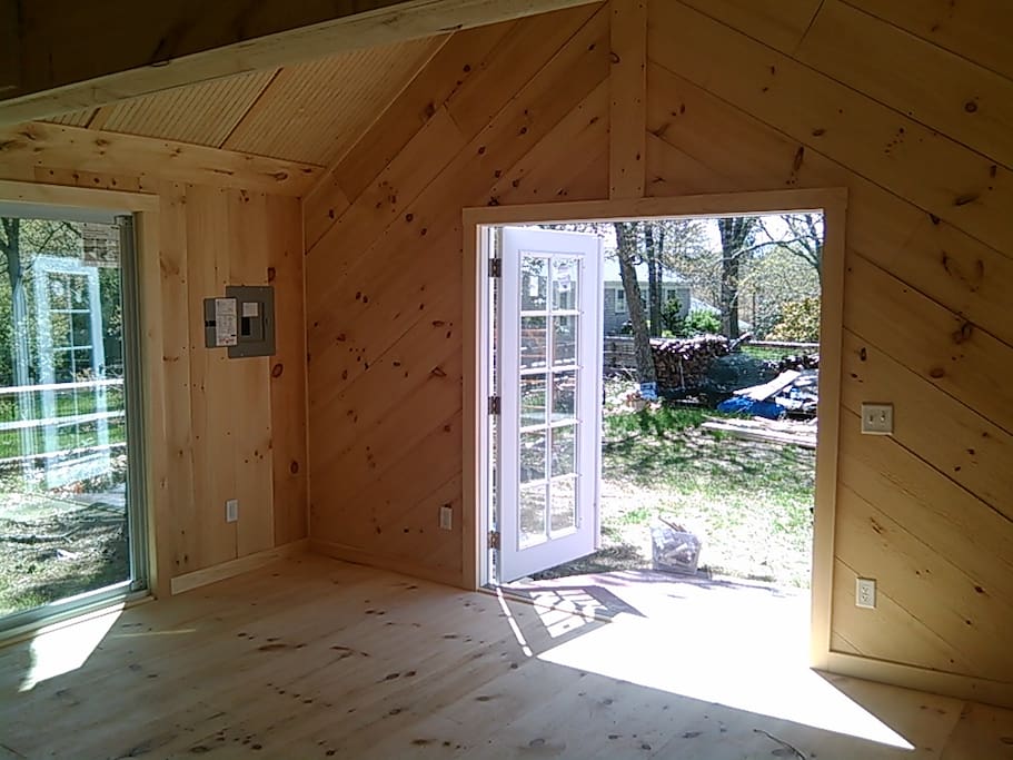 Restored as of May 2016 in beautiful pine with French Doors and 4 Sliders.