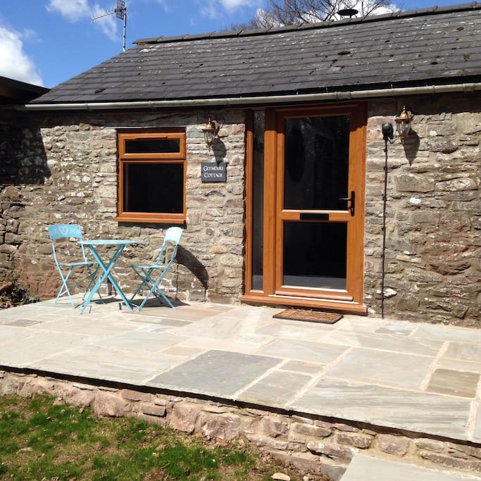 South facing patio and cottage entrance