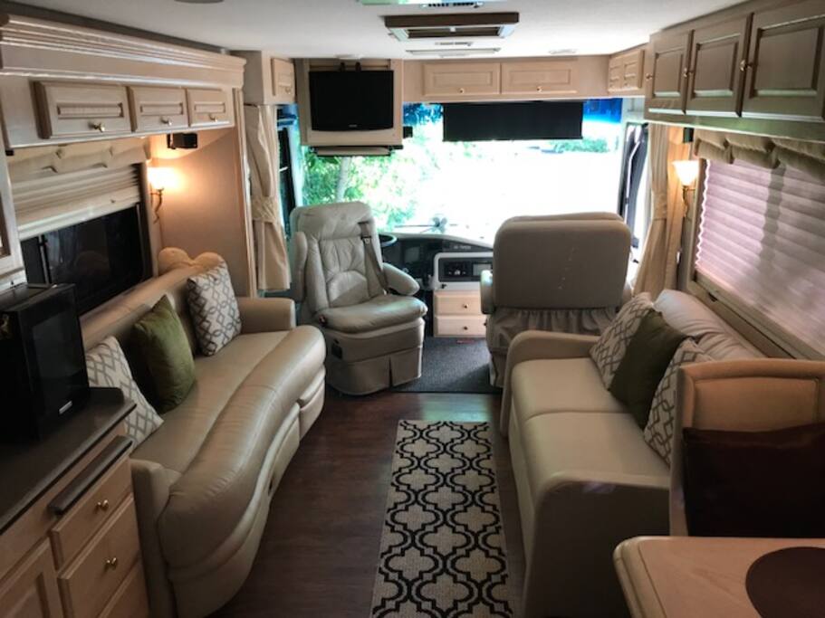 Luxury couches, either one of these will pull out to give a double sized bed, with a turn around drivers seat.