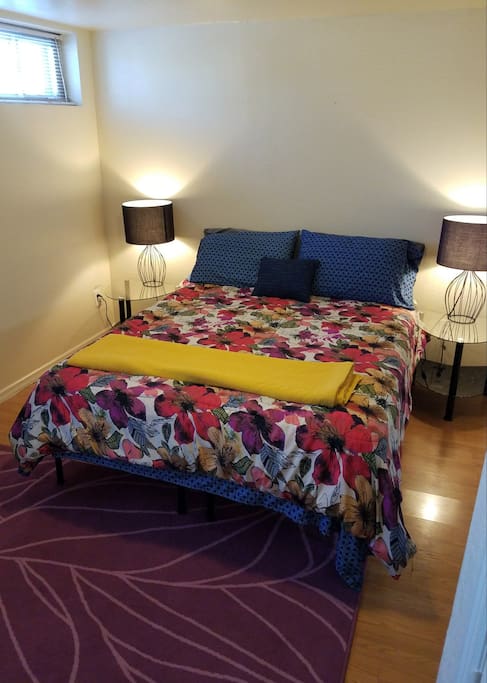 The master bedroom with a queen-size bed