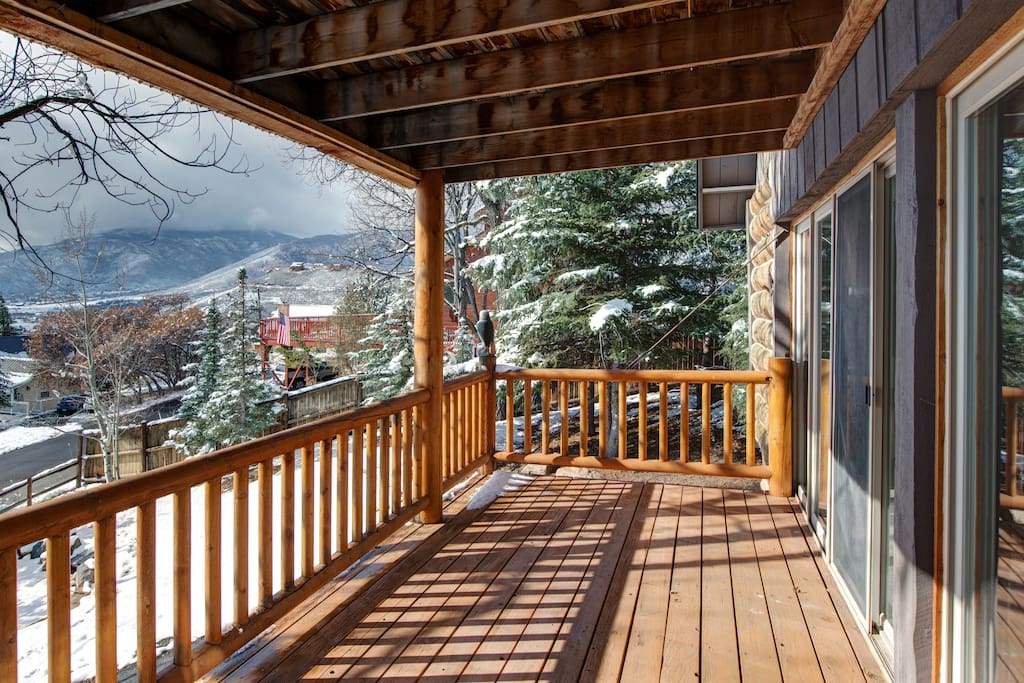 Everyone's favorite spot at this 6-bedroom house: the glorious mountain-view deck