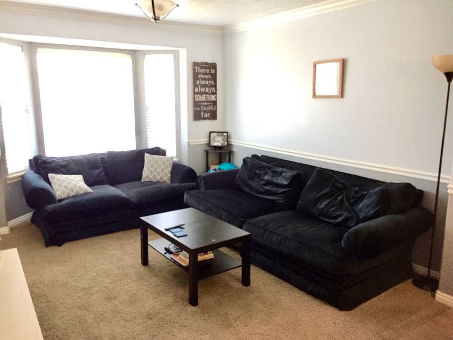 Living room with comfy couches & smart TV!