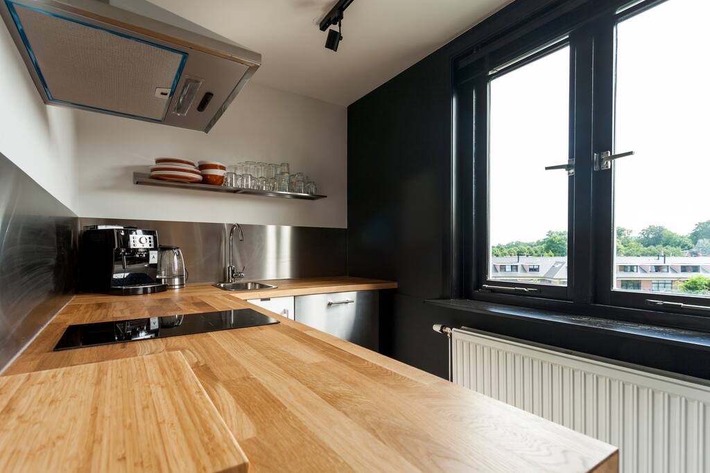 Fully equipped kitchen- dishwasher, refrigerator, induction cooker, coffee maker, water boiler, microwave