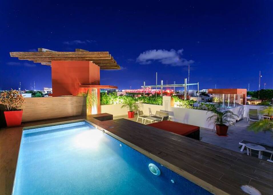 Shared rooftop pool and sitting area