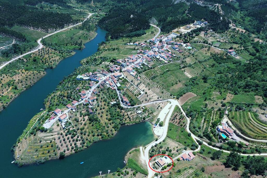 Village and house circled in red