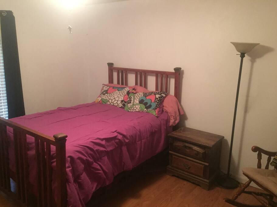 2nd bedroom with dresser and closet space