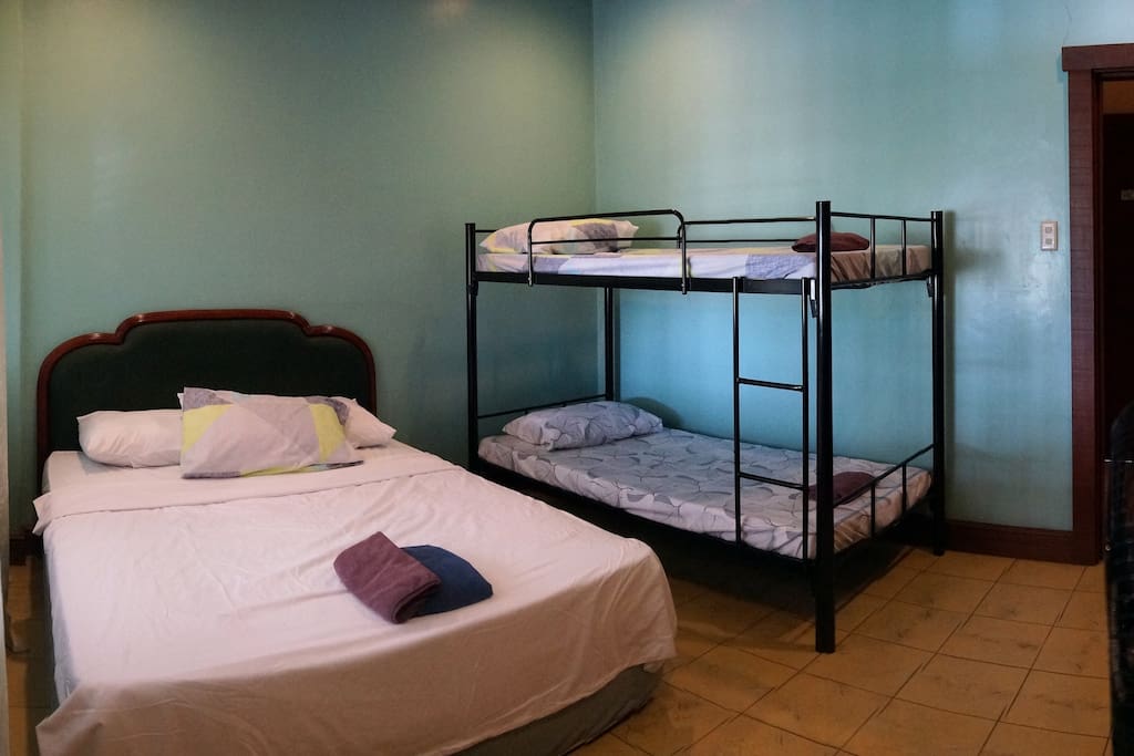 Room 1: 1 queen bed + 1 bunk bed