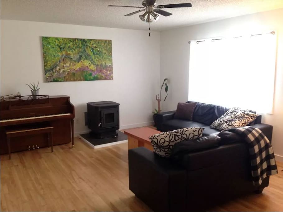 Living Room with Piano and Fireplace